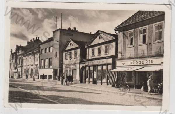  - Blovice (Plzeň - jih), pohled ulicí, obchod, reklama, bicykl